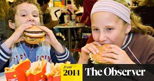 An employee wearing the mcdonald's corp. Children Who See Happy Meal Advertising Put Burger And Fries Before Healthy Choice Children The Guardian