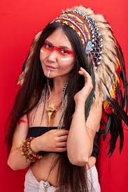 indian woman in shamanic costume posing