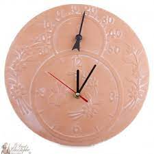 terracotta clock and thermometer