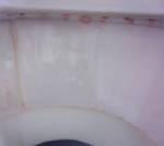 Red ring in toilet bowl