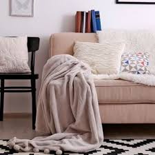 how to clean a fabric sofa at home