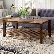 We provide a range of options, from simple, classic styles to more elaborate versions with moveable tops and integrated storage. Laurel Foundry Modern Farmhouse Athena Solid Wood Coffee Table With Storage Reviews Wayfair