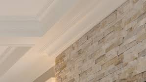 crown moulding and fireplace brick