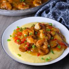 shrimp and grits with cream sauce and