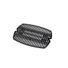 cast iron cooking grate in the grill