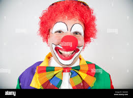 Smiling clown sur fond blanc Photo Stock - Alamy