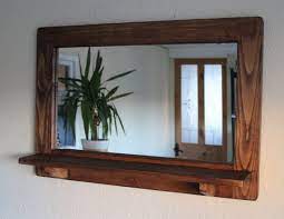 large mirror with shelf in natural wood