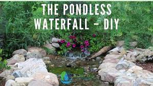 The husband put in a pondless waterfall as part of our big backyard makeover! The Pondless Waterfall Diy Backyard Water Garden
