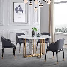 A round table and four matching armless chairs come included in this set. Modern Luxury Stainless Steel Titanium Natural Marble Round Dining Table 1 6m 1 8m Diameter View Modern Round Table Ekar Product Details From Foshan Ekar Furniture Co Ltd On Alibaba Com