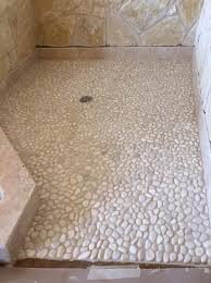 When planning your shower tile layout, consider the tile layout pattern design you would like. Pebble Tile Flooring Pebble Tile Shop