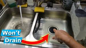 A clogged kitchen sink can be a nightmare in the kitchen. How To Snake Unclog Kitchen Sink Drain Stop Sewer Smell Youtube