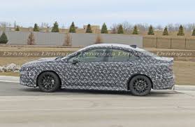 Spied! 2022 Subaru WRX caught testing against Model 3 | Driving