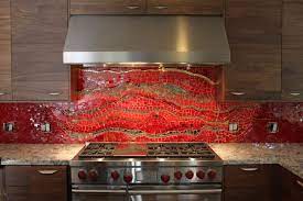 Creative homeowners who want to highlight a bold color in their new kitchen project will adore these red backsplash ideas. Bethpurcellmosaics Red Kitchen Backsplash Mosaic Backsplash Kitchen Glass Tile Backsplash Kitchen Glass Tiles Kitchen