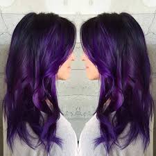 A woman with purple hair and blue eyes, dressed in black underwear, stockings and a white man's shirt sits on the back of the sofa and holds a glass of champagne or white wine in her hand. 10 Best Purple Black Hair Color Ideas To Rock In 2019 Wetellyouhow