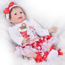 Us 54 8 29 Off 22inch Christmas Costume Reborn Doll Soft Silicone Baby Doll With Clothes Pacifier Bottle Carpet And Mini Bear Toy 1 In Dolls