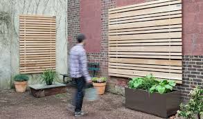 Attaching Plants To The Wood Slat Wall