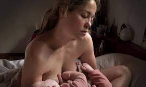 Erika Christensen posts topless throwback snap breastfeeding daughter |  Daily Mail Online
