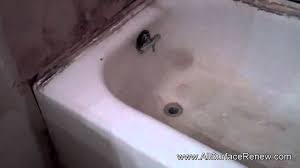 Very Stained Castiron Bathtub Renewed in White - YouTube