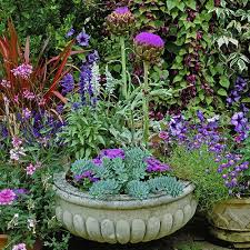 The stylish circular flower pot is solid, and the white finish adds to its lightness. Patio Plants Container Gardening With Perennials