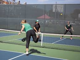 Pickleball is a paddleball sport that combines elements of badminton, table tennis, and tennis.3 two or four players use solid paddles made of wood or composite materials to hit a perforated polymer ball. Pickleball Noise Puts City In A Pickle With Players Neighbors Easy Reader News