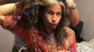 this photo of steven tyler getting