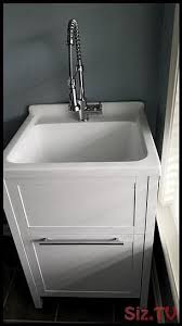 The most difficult part of removing a utility sink and cabinet may be disconnecting the sink plumbing, because it has probably become corroded in. Schon Eleni All In One Kit 24 In X 22 In X 37 8 In Acrylic Utility Sink With Cabinet In White Laundry Room Utility Sink Laundry Room Diy Utility Room Sinks