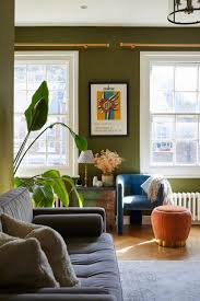 a london apartment with olive green