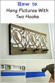 Easily Hang Picture Frames With Two Hooks