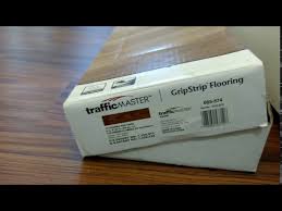 This rigid core flooring can be used throughout your home in the kitchen, living area, bathroom or even basement to create a luxurious, affordable and low maintenance flooring solution. Traffic Master Grip Strip Flooring Install Review Youtube