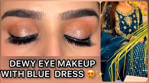 mehndi eye makeup with blue dress