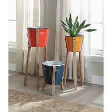 Display all the beauty of your plants and flowers with planters and plant stands. Large Red Farmstead Standing Planter Kirklands