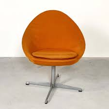 orange little egg swivel chair by