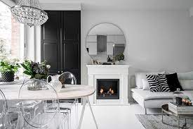 Small White Apartment With Fireplace