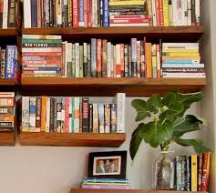 Massive Wall Of Floating Bookshelves