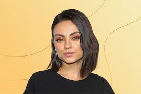 mila kunis says she bathes her dogs