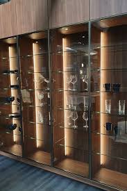 Illuminated Smoked Glass Cabinets Are