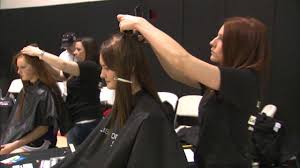 volleyball players cut hair for cancer