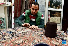 carpet repair booms in syria s aleppo
