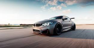 wallpaper bmw m4 on road luxurious