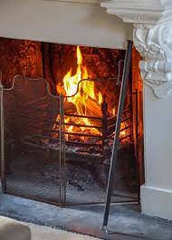 A Fireplace Grate Or Andirons