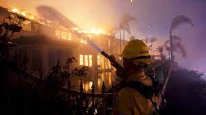 California fire destroys mansions in ...
