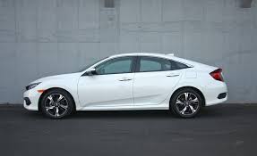 (honda hd digital traffic service only available in the united states, except alaska). 2018 Honda Civic Touring Sedan Sport Hatchback New Dad Review A Compact Car As Sensible As Ever