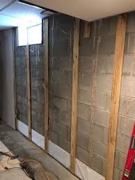 removing water damaged basement walls