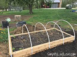 how to cover a raised garden bed to