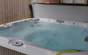 Get rid of hot tub folliculitis by performing a biofilm cleaning of the water, draining the hot tub completely, wiping it down with a mixture of water and white vinegar, and then refilling with fresh water, and balancing the alkalinity, ph, and sanitizer levels before entering. How To Clean Your Hot Tub And What Happens If You Neglect It The Spa Shoppe