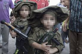 Child soldiers are used as instruments in war machines that execute even parents and friends. Palestinian Schoolchildren Brandish Toy Guns In Gaza Military March As The Future Soldiers Of Hamas World News Mirror Online