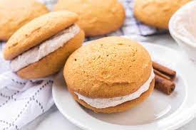 pumpkin whoopie pies with a whipped