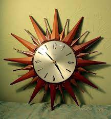 1960s sunburst clock vintage