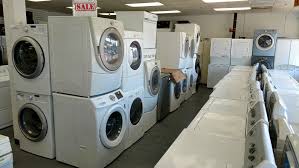 Stacked washer & dryer set with front load washer and electric dryer in white. Used Washers And Dryers Pg Used Appliances