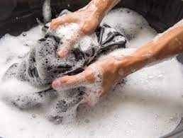 washing your clothes in hot water